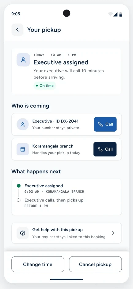 Your pickup: executive assigned, with an ID and separate call buttons for the executive and the Koramangala branch.